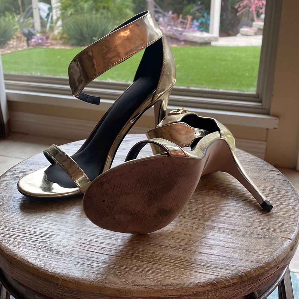 Used Gold Heels. Heels are 3.75.